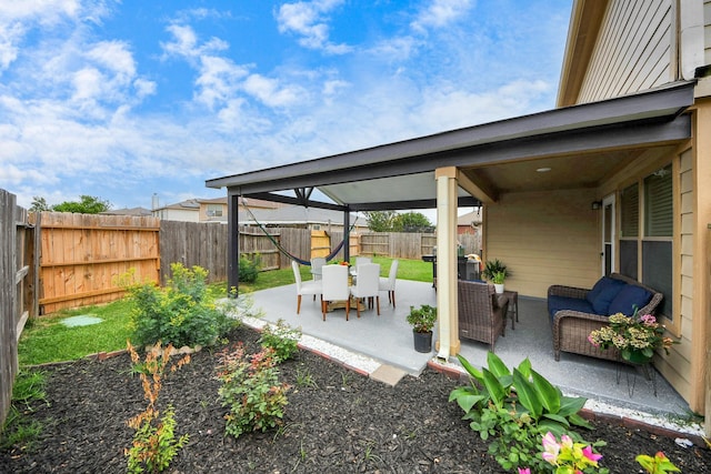 19110 Remington Springs Dr, Houston, TX 77073 - fenced backyard featuring an outdoor living space and a patio