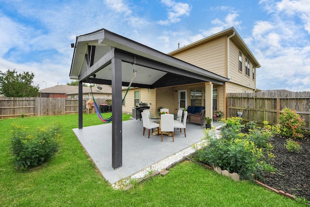 19110 Remington Springs Dr, Houston, TX 77073 - fenced backyard featuring a patio and grilling area