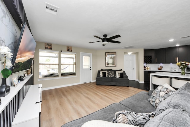 19110 Remington Springs Dr, Houston, TX 77073 - living area with ceiling fan, light wood finished floors, and recessed lighting