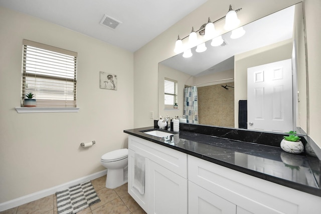 19110 Remington Springs Dr, Houston, TX 77073 - bathroom with vanity, tiled shower, and tile patterned flooring
