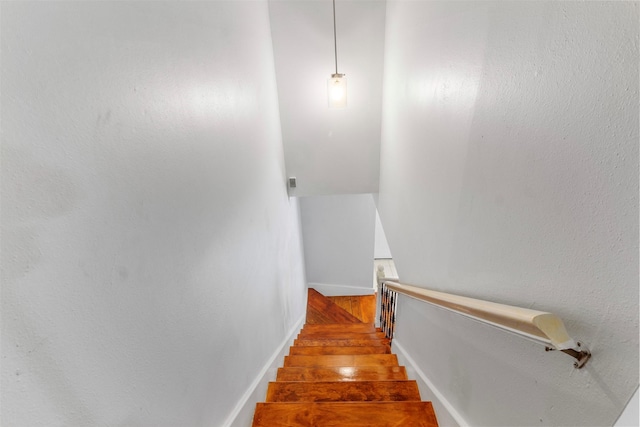 14333 Memorial Dr Unit 44, Houston, TX 77079 - stairway featuring wood finished floors and baseboards