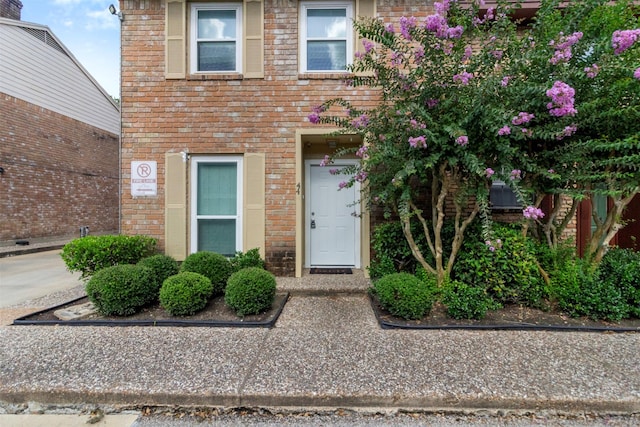 14333 Memorial Dr Unit 44, Houston, TX 77079 - doorway to property featuring brick siding