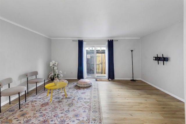14333 Memorial Dr Unit 44, Houston, TX 77079 - sitting room featuring wood finished floors and crown molding