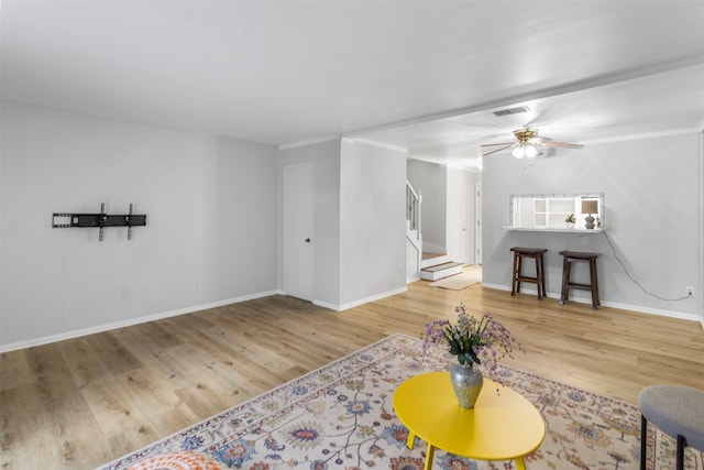 14333 Memorial Dr Unit 44, Houston, TX 77079 - living room with wood finished floors, stairway, and a ceiling fan