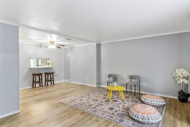 14333 Memorial Dr Unit 44, Houston, TX 77079 - living area featuring wood finished floors, a ceiling fan, and crown molding