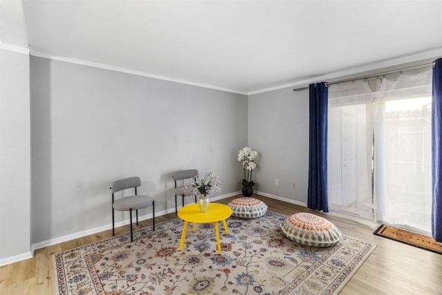 14333 Memorial Dr Unit 44, Houston, TX 77079 - sitting room featuring wood finished floors and crown molding
