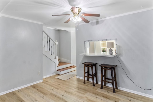 14333 Memorial Dr Unit 44, Houston, TX 77079 - spare room with a ceiling fan, wood finished floors, and stairway
