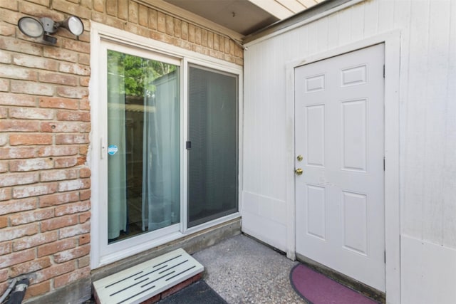 14333 Memorial Dr Unit 44, Houston, TX 77079 - doorway to property featuring brick siding