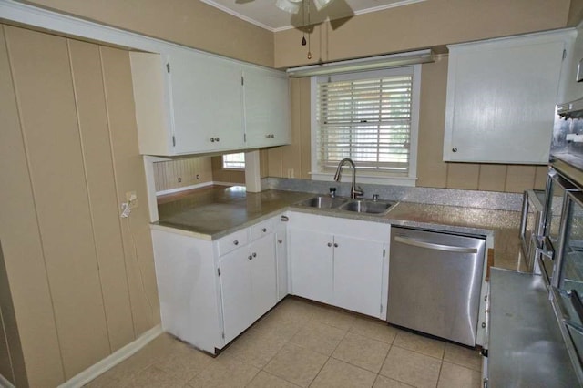 524 Oak Dr, Lake Jackson, TX 77566 - kitchen featuring stainless steel dishwasher, ceiling fan, white cabinetry, light tile patterned floors, and ornamental molding