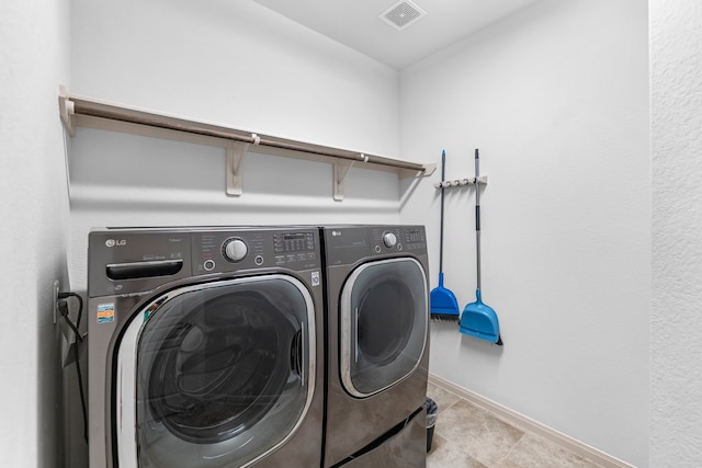 30212 Green Meadows Ln, Brookshire, TX 77423 - laundry area featuring separate washer and dryer and tile patterned floors