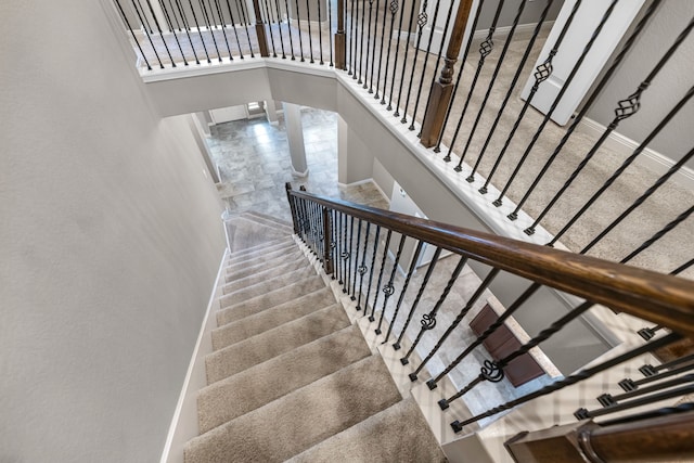 30212 Green Meadows Ln, Brookshire, TX 77423 - stairway with a towering ceiling and baseboards