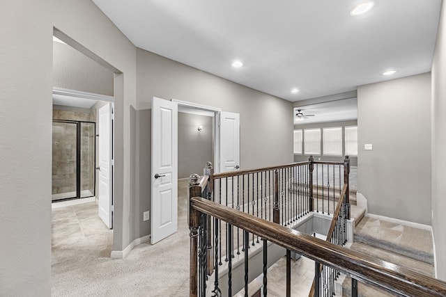 30212 Green Meadows Ln, Brookshire, TX 77423 - hall featuring an upstairs landing, recessed lighting, and light carpet