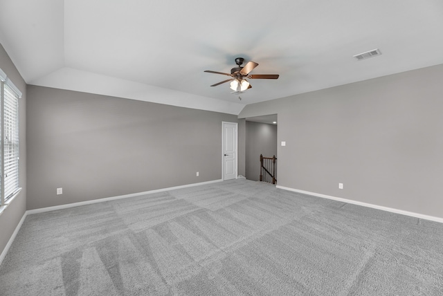 30212 Green Meadows Ln, Brookshire, TX 77423 - spare room with ceiling fan, carpet floors, and vaulted ceiling