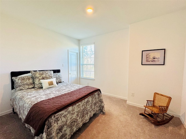 11119 Alpenhorn Pl, Tomball, TX 77375 - carpeted bedroom with baseboards