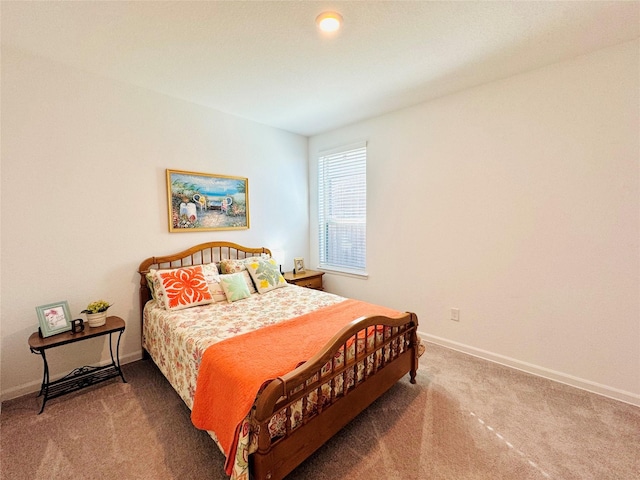 11119 Alpenhorn Pl, Tomball, TX 77375 - carpeted bedroom featuring baseboards