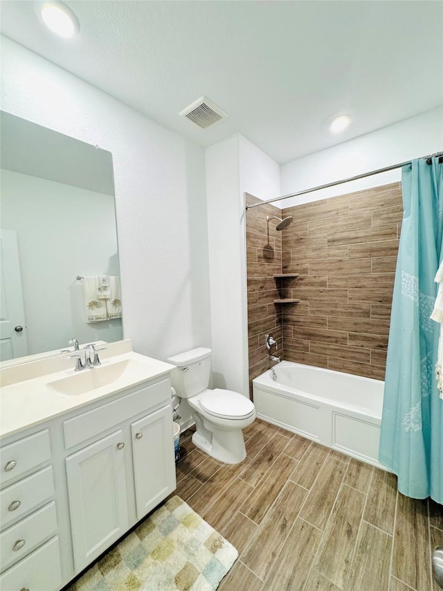 11119 Alpenhorn Pl, Tomball, TX 77375 - full bath with wood tiled floors, vanity, and shower / tub combo with curtain