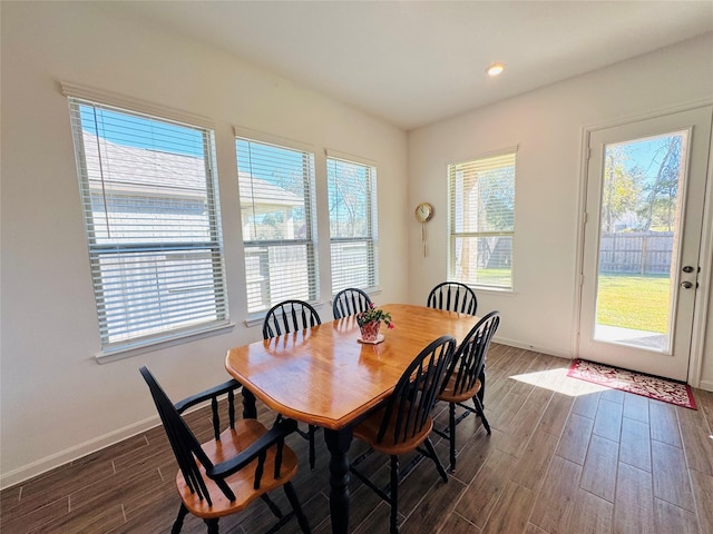 11119 Alpenhorn Pl, Tomball, TX 77375 - dining space with dark wood-style flooring and recessed lighting
