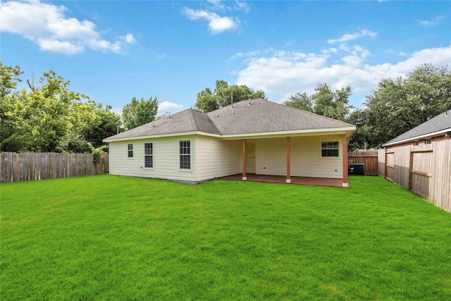 3722 Kildare Dr, Houston, TX 77047 - back of house with a fenced backyard and a shingled roof
