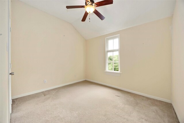 3722 Kildare Dr, Houston, TX 77047 - unfurnished room featuring lofted ceiling, light carpet, and a ceiling fan