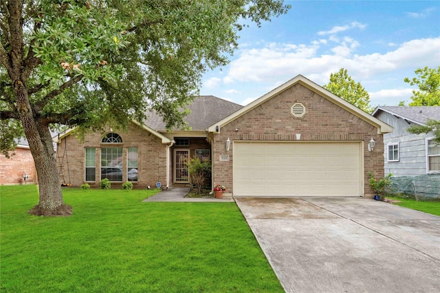3722 Kildare Dr, Houston, TX 77047 - ranch-style house featuring brick siding, a garage, concrete driveway, and a front lawn