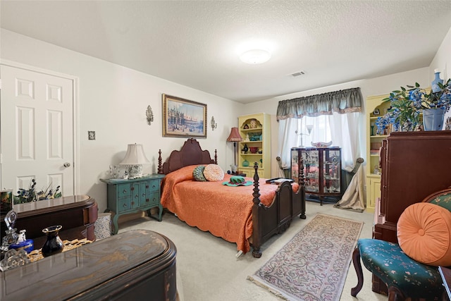 16535 Mccormick Dr, Houston, TX 77095 - bedroom with light carpet and a textured ceiling