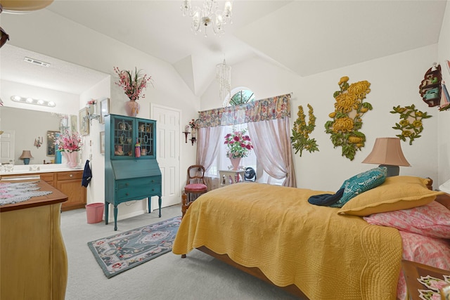 16535 Mccormick Dr, Houston, TX 77095 - bedroom featuring light carpet, a chandelier, lofted ceiling, a closet, and connected bathroom