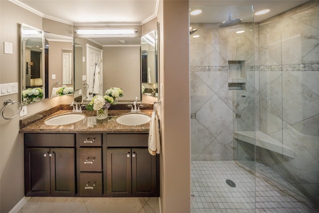5001 Woodway Dr Unit 1704, Houston, TX 77056 - full bath with a shower stall, double vanity, ornamental molding, and tile patterned floors