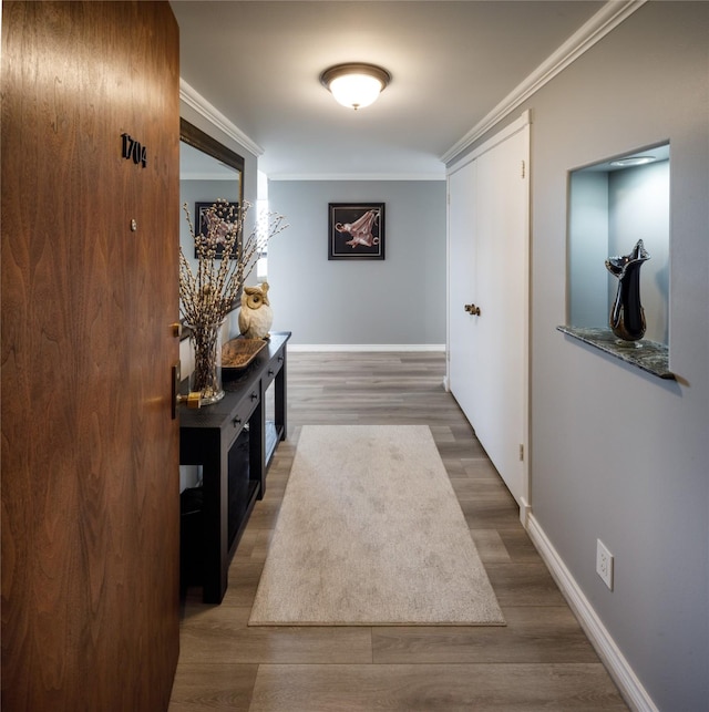 5001 Woodway Dr Unit 1704, Houston, TX 77056 - hall featuring crown molding and wood finished floors