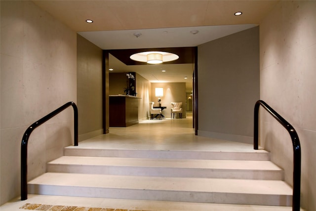 5001 Woodway Dr Unit 1704, Houston, TX 77056 - staircase featuring recessed lighting
