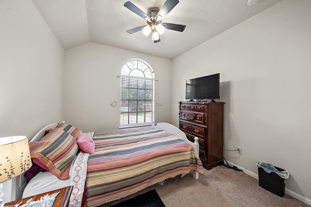 14711 Trailbrook Dr, Houston, TX 77095 - carpeted bedroom featuring vaulted ceiling, a ceiling fan, and a textured ceiling