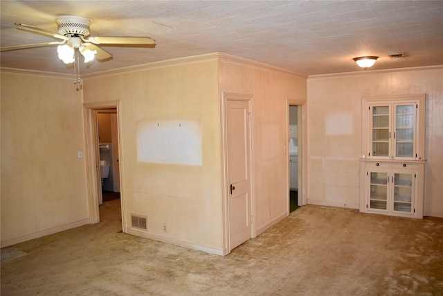 801 Erin St, El Campo, TX 77437 - carpeted spare room with ceiling fan and ornamental molding