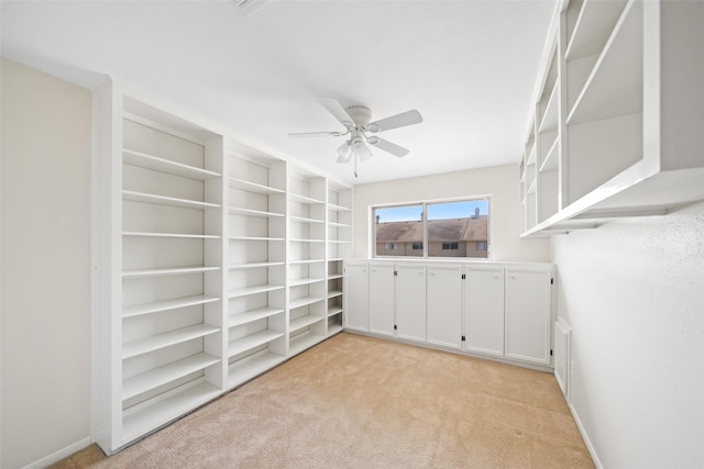 14708 Perthshire Rd Unit F, Houston, TX 77079 - unfurnished room with light colored carpet and ceiling fan