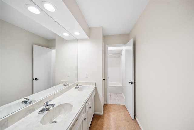 14708 Perthshire Rd Unit F, Houston, TX 77079 - full bathroom with double vanity and recessed lighting