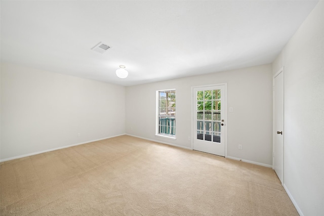 14708 Perthshire Rd Unit F, Houston, TX 77079 - spare room with light colored carpet and baseboards