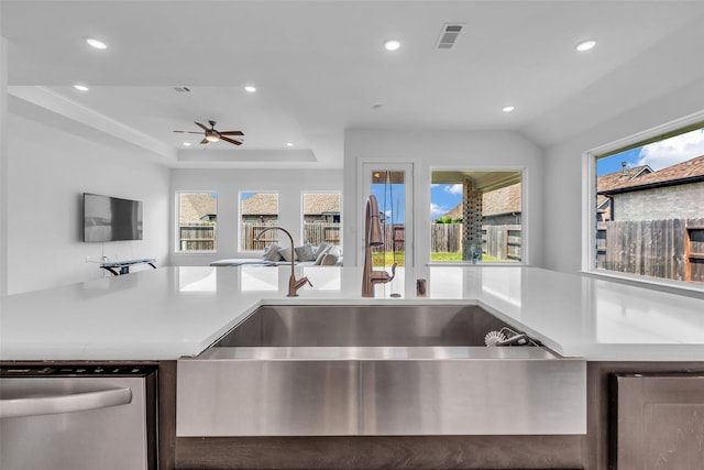 10614 Hazel Hills Dr, Cypress, TX 77433 - kitchen with stainless steel dishwasher, open floor plan, recessed lighting, a ceiling fan, and healthy amount of natural light