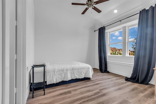 10614 Hazel Hills Dr, Cypress, TX 77433 - bedroom with wood finished floors, recessed lighting, and a ceiling fan
