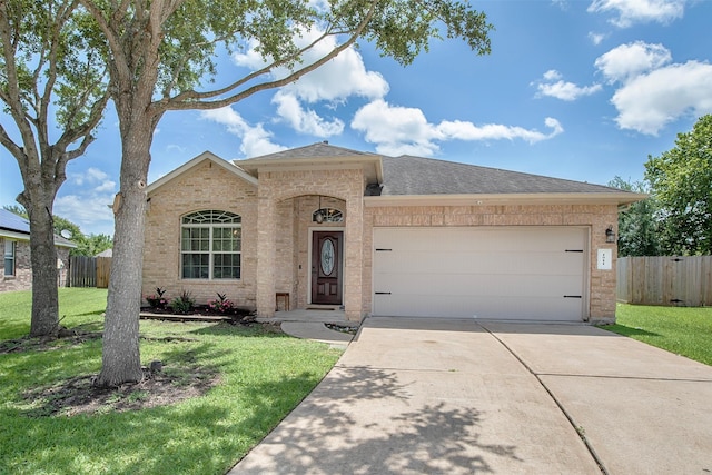 1911 Vineyard Bend Ct, Pearland, TX 77581 - view of front of property featuring brick siding, a garage, driveway, and a shingled roof