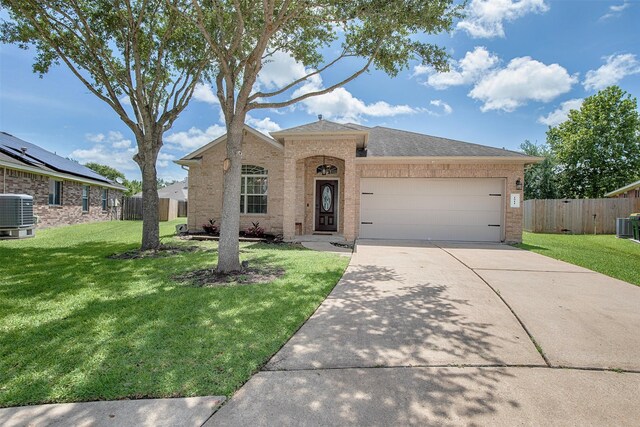 1911 Vineyard Bend Ct, Pearland, TX 77581 - view of front of house featuring brick siding, concrete driveway, a garage, and a shingled roof