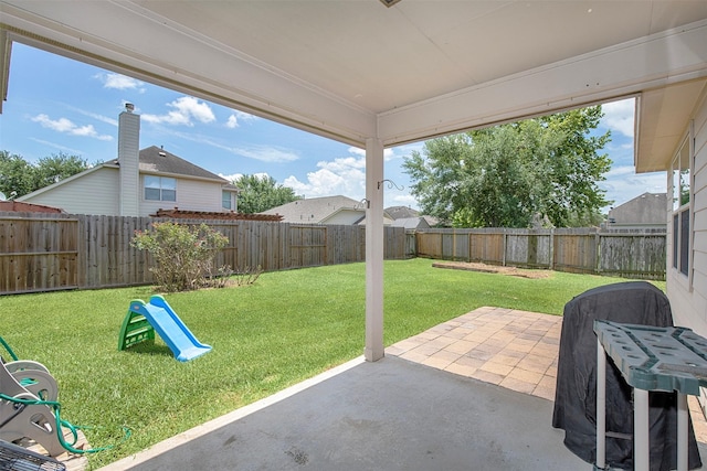 1911 Vineyard Bend Ct, Pearland, TX 77581 - fenced backyard with a patio