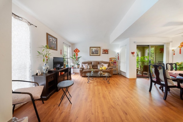 6602 Harbor Town Dr Unit 506, Houston, TX 77036 - living area featuring plenty of natural light and light wood finished floors