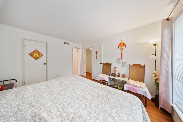 6602 Harbor Town Dr Unit 506, Houston, TX 77036 - bedroom featuring light wood finished floors