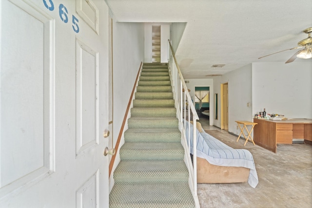 5700 Brookglen Dr Unit 565, Houston, TX 77017 - staircase with ceiling fan