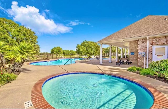 22 Crestview Trl, Houston, TX 77082 - community pool featuring a patio