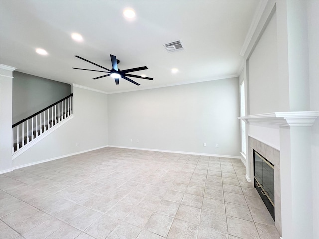 22 Crestview Trl, Houston, TX 77082 - unfurnished living room featuring recessed lighting, a ceiling fan, a tiled fireplace, ornamental molding, and stairway