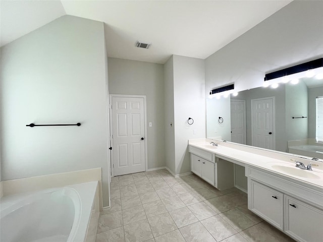 22 Crestview Trl, Houston, TX 77082 - bathroom with a garden tub, double vanity, and lofted ceiling