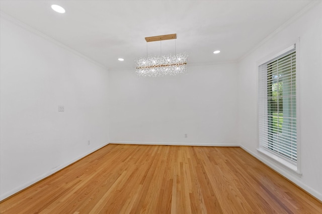 7807 Ella Lee Ln, Houston, TX 77063 - empty room with ornamental molding, light wood-style floors, a chandelier, and recessed lighting