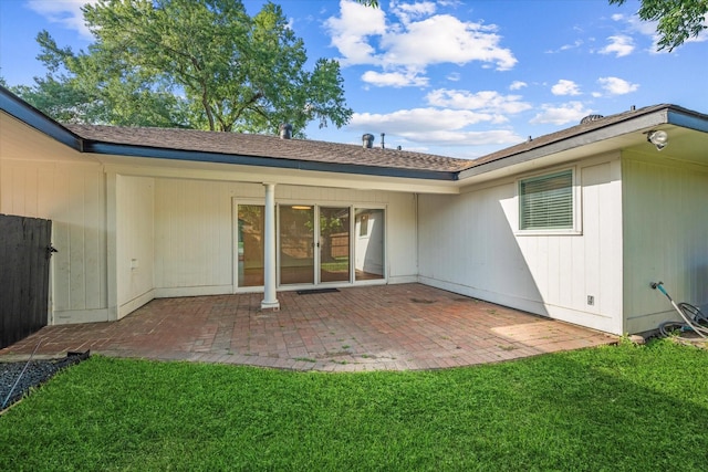 7807 Ella Lee Ln, Houston, TX 77063 - rear view of property featuring a lawn and a patio