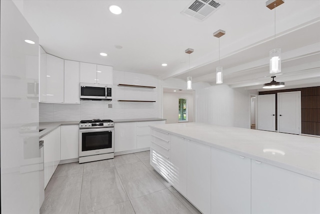 7807 Ella Lee Ln, Houston, TX 77063 - kitchen featuring stainless steel appliances, modern cabinets, open shelves, white cabinetry, and light countertops
