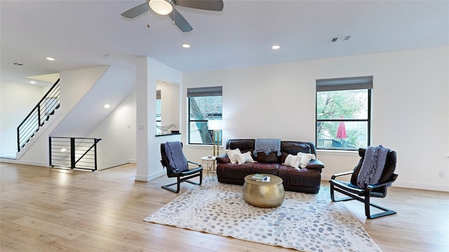 1767 Michigan St, Houston, TX 77006 - living area with light wood-style flooring, ceiling fan, stairs, and recessed lighting