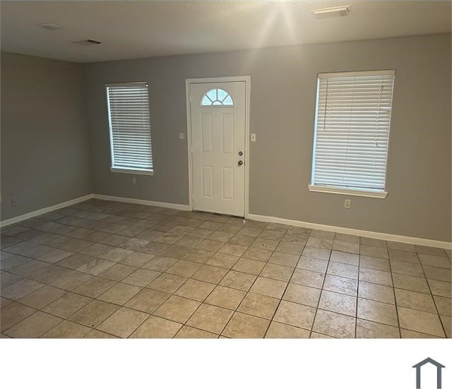 3629 Lydia St Unit A, Houston, TX 77021 - entrance foyer with light tile patterned floors and baseboards